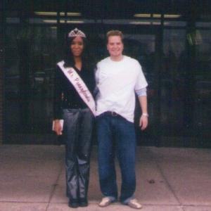 Ms. Pennsylvania 2004 Maria Frisby posing with a fan at the ABC North Bowling Lanes.