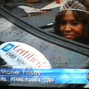 Ms Pennsylvania 2004 Maria Frisby waving to fans and the television audience at the 2004 Harrisburg Holiday Parade