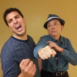 Getting punched by legendary actor James Hong.