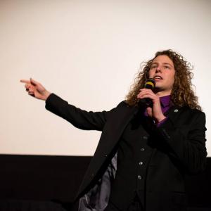 Producer Victor Lord giving a speech at a private screening of Some Are Born