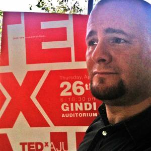 Daniel Lawrence Abrams giving a TEDx Talk entitled Sports Can Save Politics at the AJU campus