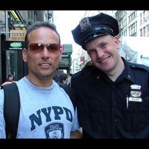 In New York City with a police officer on the street