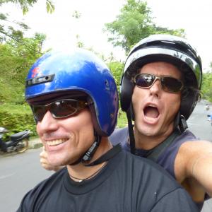 Jeffrey Ventre and David White on a scooter in Bali, Indonesia