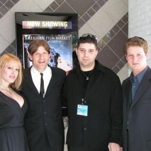 Evgeny Afineevsky and Crispin Glover with his girlfriend on the market screening of Crime and Punishment AFM 2002