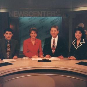John at anchor desk in Nebraska with Seth, Peggy and Tara
