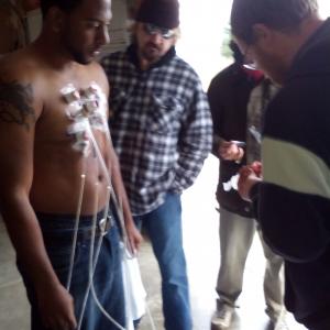 John oversees setting of squibs on actor Eddie Flake with Cliff Goldsmith and John Nichols in Columbia Illinois for UABRS film