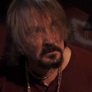 John Brandon as Cheeseburger the drug dealer in Under a Blood Red Sky film