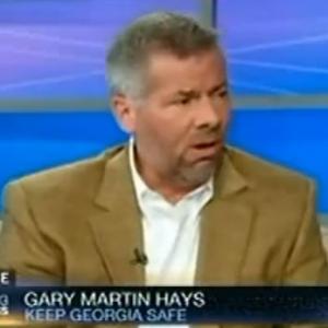 Gary Martin Hays appearing on CNNs Headline News Evening Express