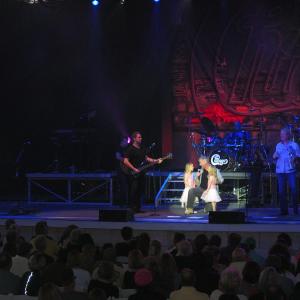 Gary Martin Hays and two of his daughters performing at the St. Augustine Amphitheater with the legendary band Chicago.