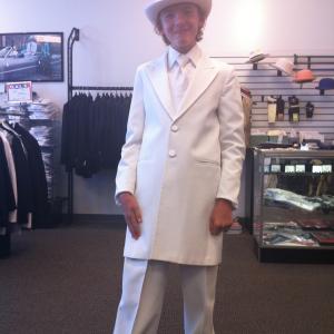 Adam trying on costume for Fred Astaire number Top Hat and Tails
