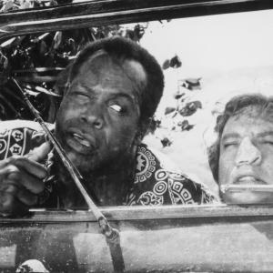 Still of Danny Glover and Martin Short in Pure Luck (1991)