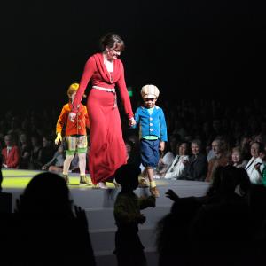 Aidan being a gentleman as he walks the designer down the stairs at FIDM's DEBUT 2013.