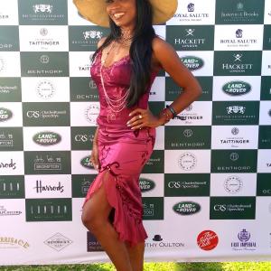 Olympia LePoint, a Celebrity Guest at the 2015 British Polo Day Event hosted by Members of the British Royal Family. Image published The Huffington Post News.