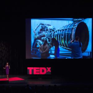 Olympia LePoint explains her experience as an award-winning rocket scientist for NASA's Space Shuttle Program on stage at the TED Conference, TEDxPCC.