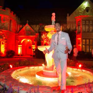 Noel Braham in front of The Playboy Mansion for the Pre Espy's BearTrap annual event.
