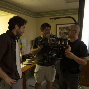 Ryan Anthony having a discussion onset about the set up of a shot