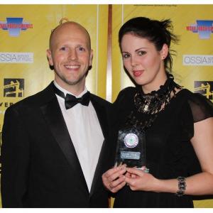 Emma Dark winning the MMBF Rising Star award at The Yellow Fever Independent Film Festival 2015 for Seize the Night Pictured here with festival director George Clarke