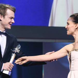 Sven Schelker receives the Shooting Star award from Natalie Portman at the 65 Berlinale 2015
