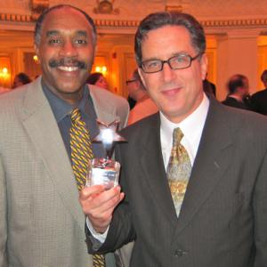 Duncan Putney holds his 2013 Imaginnaire Award with OCD Associates coproducer Andre Stark