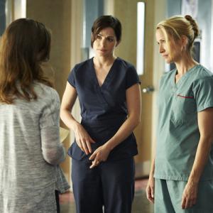 Still of Michelle Nolden and Erica Durance in Saving Hope (2012)