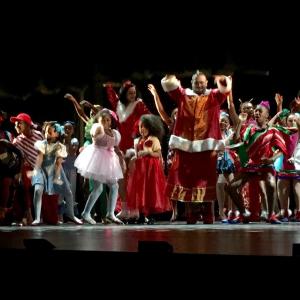 Debbie Allen's Hot Chocolate Nutcracker at the Dorothy Chandler Pavilion December 2015. Jessica light pink pointing at audience. Tichina Arnold silver dress