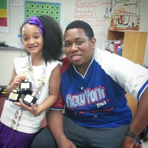 Aja and Director Henderson Maddox with her numerous acting awards she had won