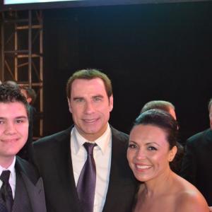 Sean Patrick Flaherty, John Travolta, and Sandra Santiago