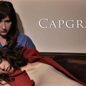 Irene Kuykendall stars as Alma in Open Door Development's independent feature film, CAPGRAS. The film follows Alma's mental and emotional unraveling as she questions a reality crumbling before her. The film is both experimental and dark in nature.