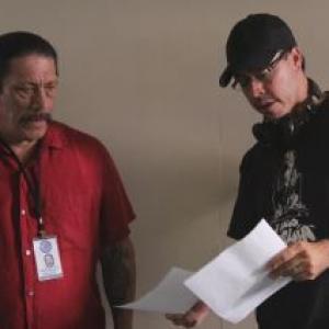 Discussing the scene with Danny Trejo on the set of Counterpunch