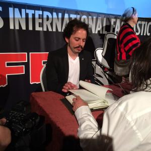 Isaac Ezban signing autographs after the screening of THE INCIDENT at BIFFF (Brussels International Fantastic Film Festival), April 2015