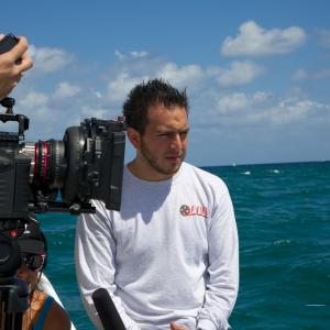 Aaron directing short film Travelers In Time on a boat before doing underwater scenes 2014