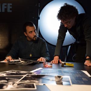 On set of Safe  director Christopher Kay discusses an upcoming shot with DOP Filip Laureys