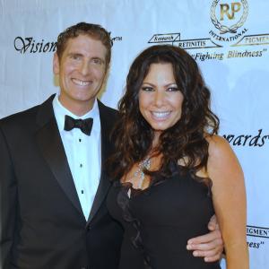 Dr. Brian Boxer Wachler being honored at national Vision Awards with wife Selina Boxer Wachler
