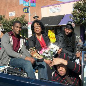 Jared Davis riding in Martin Luther King Day Parade with Council Woman Jan Perry