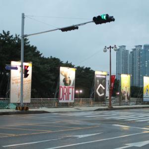 CLYDECYNIC poster as a billboard on the boulevard, Busan, South Korea
