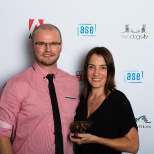 Melanie accepting the award for Best Editing in a Documentary Program at the ASE Ellie Awards 2014 With Adobes Jon Barrie