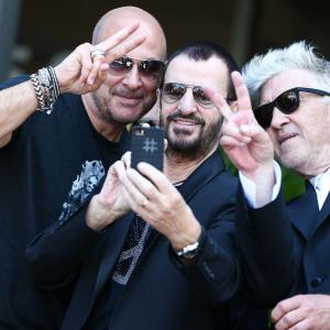 Designer John Varvatos, musician Ringo Starr, and director David Lynch attend the announcement of special collaboration of John Varvatos and Ringo Starr on occasion of Ringo's birthday at Capitol Records Studio on July 7, 2014 in Hollywood, California.