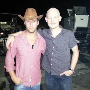 on set with lead singer of the Fray