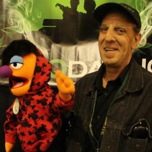 Scott j Migdol Executive Producer filming Green Gold TV show pilot in San Jose California with the puppet Burner.