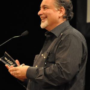 Luis Arambilet receiving Award for Best Screenplay of the Year (Código PAz, 2015). ADOCINE Annual Awards.