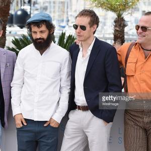 Actors Levente Molnar and Geza Rohrig director Laszlo Nemes and actor Urs Rechn attend the Saul Fia Son Of Paul Photocall during the 68th annual Cannes Film Festival on May 15 2015 in Cannes France