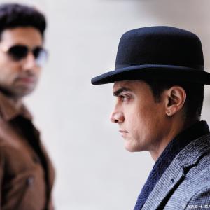 Still of Abhishek Bachchan and Aamir Khan in Dhoom3 2013