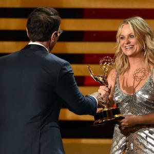 Ty Burrell and Amy Poehler at event of The 66th Primetime Emmy Awards 2014
