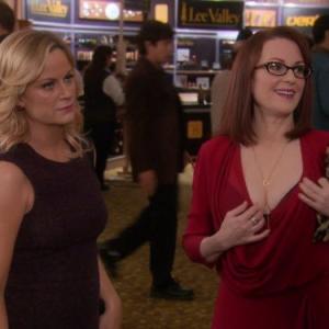 Still of Megan Mullally and Amy Poehler in Parks and Recreation (2009)