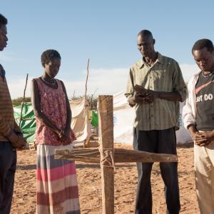 Still of Arnold Oceng Ger Duany Emmanuel Jal and Kuoth Wiel in The Good Lie 2014