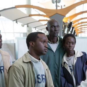 Still of Arnold Oceng Ger Duany Emmanuel Jal and Kuoth Wiel in The Good Lie 2014