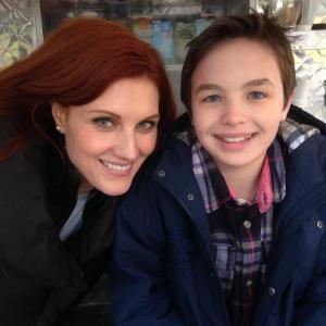 Logan Williams and actress Michelle Harrison on the set of The Flash