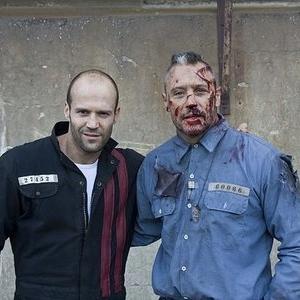 Still of Max Ryan, Jason Statham on Death Race set
