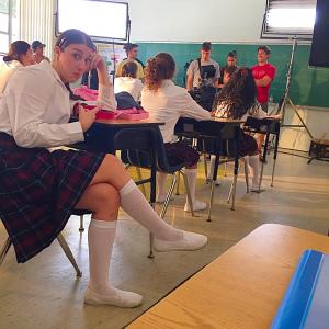 Mary Rachel as a featured dancercatholic school girl in the feature film Breaking Legs