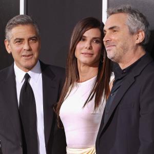 Sandra Bullock, George Clooney and Alfonso Cuarón at event of Gravitacija (2013)